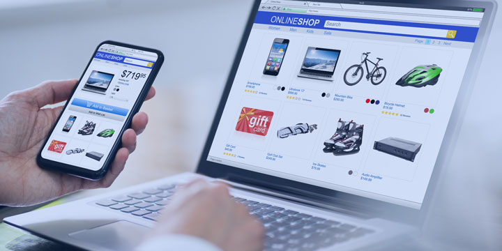 man browsing ecommerce business on mobile and desktop